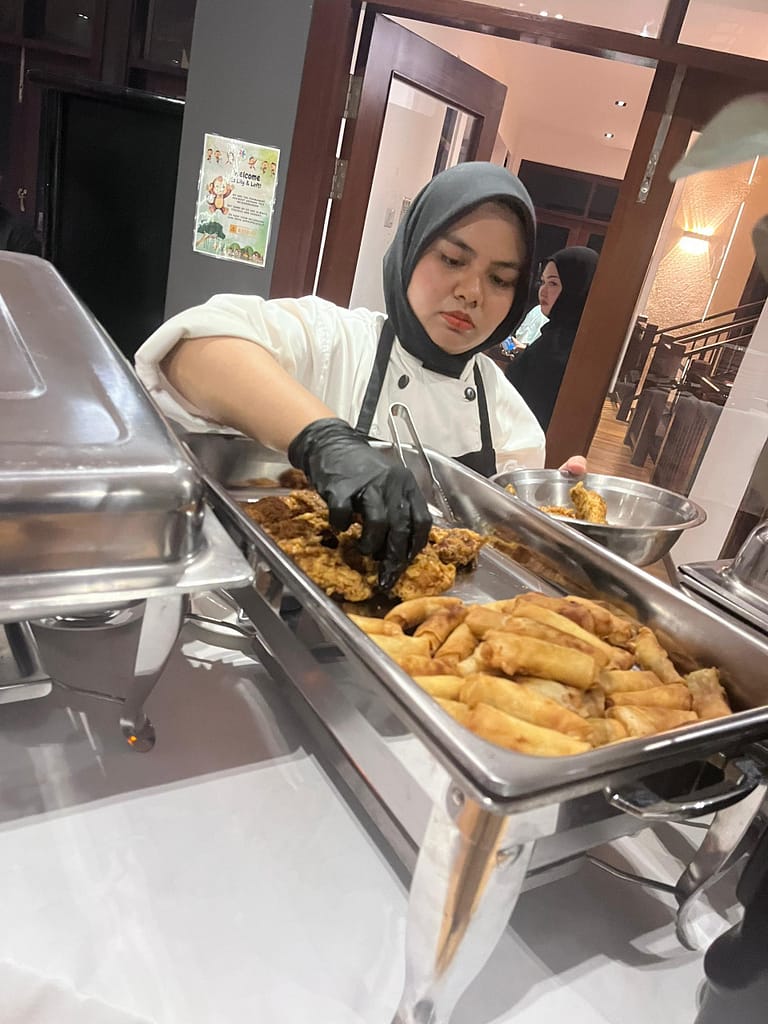 Private Chef Setting Up Buffet